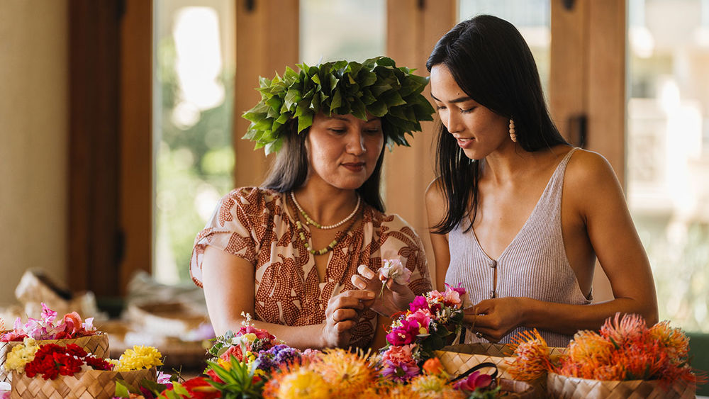 Making lei from beautiful flowers is a popular guest activity.