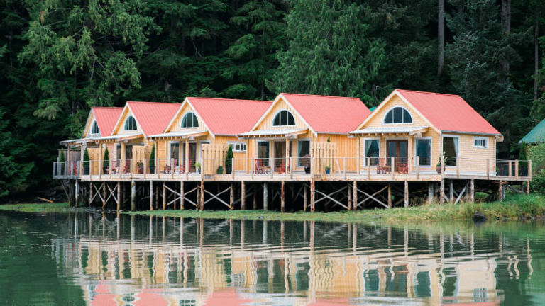 Guests can watch the tide ebb and flow from a Nimmo Bay Resort cabin. // © 2017 Nimmo Bay Resort
