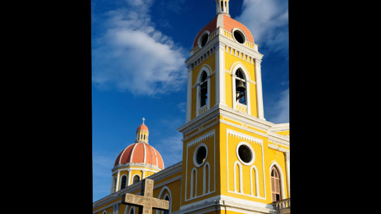 History and architecture buffs will love Granada, Nicaragua’s many colonial buildings. // © 2018 Getty Images