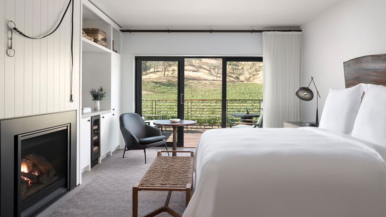 Modern, comfortable guestrooms offer idyllic vineyard views.