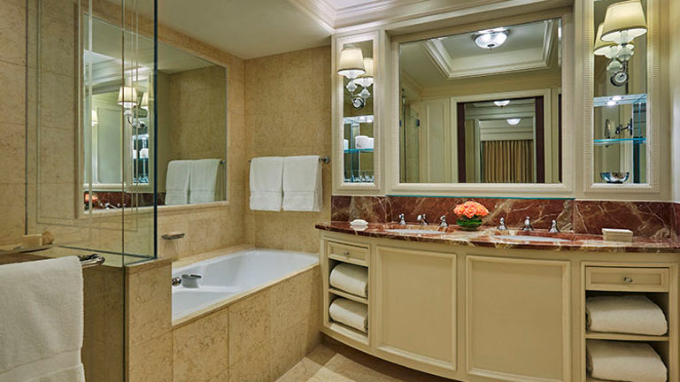 One of two bathrooms in the Ambassador Suite, which includes a soaking tub and a separate shower // © 2015 Christian Horan/Four Seasons Hotel Doha