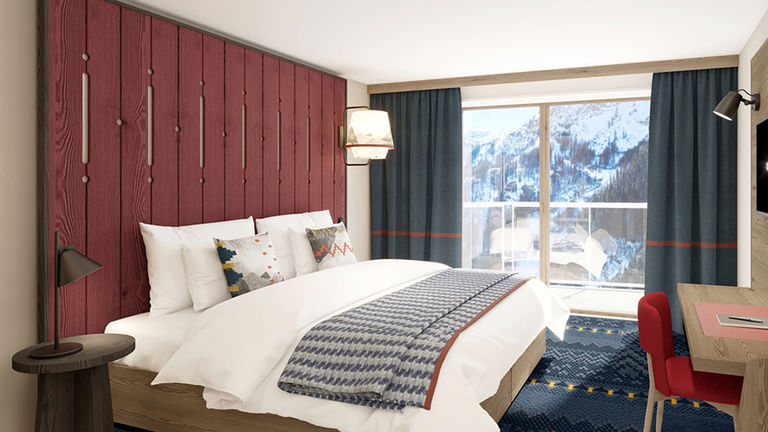 The property has 430 guestrooms and features mountain views.