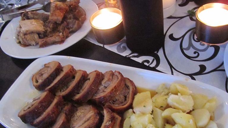 Traditional Serbian fare, such as roasted pork and potatoes, was served at the event. // © 2016 Elizabeth Dupuis