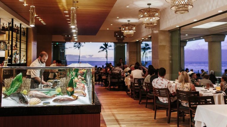 Wolfgang Puck’s Maui restaurant offers spectacular panoramic ocean views from its second-story perch.